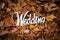 Autumn wedding wooden sign on the leafage