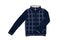 Autumn and winter clothes children. A cozy warm dark blue cardigan or jacket with a white checkered pattern for the little boy