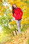 Autumn woman happy lifestyle in fall forest