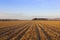 Autumn woodland and stubble field