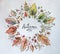 The autumn wreath for holiday. Watercolor clip art with pine cone, stick and acorn. The image wreath for object, frame