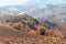 Autumn with yellow and orange trees on the Marche`s hill in the Montefeltro region