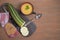 Autumn zucchini and pumpkin soup on a brown wooden background, sliced zucchini on a wooden cutting Board