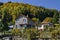 Autumnal colorful forest and house in the villaje Zheleznitsa, Sofia, Vitosha mountain