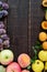 Autumnal food background. Crop of fruit on wooden background.