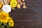 Autumnal food background. Crop of vegetables and fruit on wooden background.