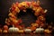 Autumnal harvest wreath with pumpkins gourds and