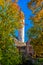 Autumnal idyllic romantic image of historical castle tower, moat, old buildings in Frankfurt-Hoechst, Germany, Europe