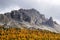 Autumnal landscape of Cadini di Misurina seen from the shore of Misurina Lake.