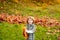 Autumnal mood. Autumn kids portrait. Happy child, little boy laughing and playing in the fall leaves on nature walk