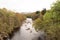 Autumnal panoramic view of mountains and River Tummel in Scotland