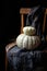 Autumnal still life on dark photography with two grey pumpkins on vintage chair