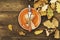 Autumnal table setting for Thanksgiving dinner. Empty plate, cutlery, colored leaves on wooden table. Fall food concept.