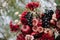 Autumnal wedding composition of roses, apples, grape and pomergranate