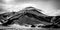 Avacha Volcano. Lenticular lens-shaped clouds above the volcano. Kamchatka Peninsula, Russia