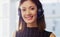 We are available 247. Cropped portrait of an attractive young businesswoman wearing a headset while in the office during