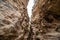 Avakas Gorge in Cyprus. Little river in foreground, sunlit rocks are in background