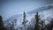 Avalanche risk zone. Landscape with dramatic cliff side on snowy mountain