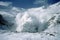 avalanche of snow and ice tumbling down mountain, with view of the distant landscape visible