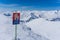 Avalanche warning sign, winter landscape