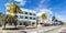 Avalon Hotel in Art Deco architecture style and classic car panorama on Ocean Drive in Miami Beach Florida, United States