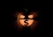 Avaricious insatiable Halloween pumpkin love a money, U.S. dollars on black