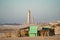 Aveiro Lighthouse in Portugal with garbage and construction debris blurred intentionally in foreground