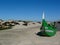 Aveiro, Portugal-DecembBoat stranded on the dune and broken wooden house.