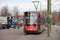 Avenio red and black trams runned by HTM for R-NET at Den Haag Central train station on the street