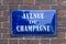 Avenue de Champagne sign on red brick wall in Epernay, France