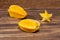 Averrhoa Carambolo - Star Fruit Or Carambola; Photo On Wooden Background