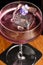 Aviation, drink with gin, lemon juice,maraschino liqueur and violet cream liqueur standing on bar counter
