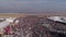 Aviation festival crowd and stunt fighter planes with red and white smoke