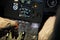 Aviators checking engine systems on flight deck