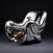 Avicii-inspired Liquid Metal Armchair: Artistic Silver Chair With Dynamic Energy Flow