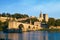 Avignon Bridge with Popes Palace and Rhone river at sunrise