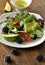 Avocado, blackberry, fresh herbs, Ñucumber and tomato salad with lime dressing