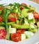 Avocado cherry tomato argula leave salad