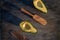 Avocado decorated on wood with wooden shovels