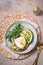 Avocado egg sandwich. Healthy light breakfast concept. Whole grain toasts with avocado and fried pesto eggs