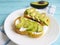 Avocado fresh sandwich sesame organic on a diet wooden