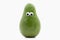 Avocado with googly eyes on white background