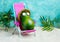 Avocado in hat and sunglasses  relaxes on  lounge chair on  beach. Summer tropical minimal humor poster