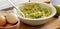 Avocado Mashing in a Bowl on Wooden Board