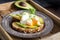 Avocado poached egg toast on plate in vintage wooden tray