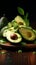 Avocado presentation on a wooden background with enticing dark atmosphere