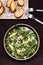 Avocado, Shrimp and Arugula Salad in a plate and toasts grill