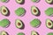 Avocado toast with avocado slice pattern on pink background. Food pattern with sunlight