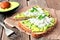 Avocado toast with egg whites and pea shoots