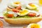 Avocado toast with eggs and tomatos